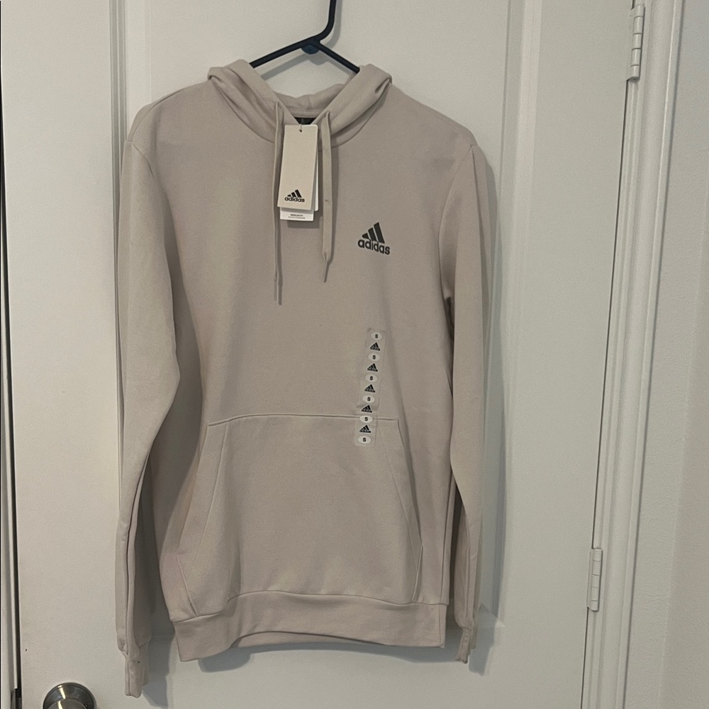 Adidas sweatshirt.